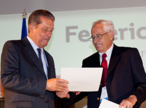 2012, FEBS NEWS: Prof. Federico Mayor-Zaragoza (left) receiving the FEBS Diplôme d’Honneur from Prof. Israel Pecht, FEBS Secretary General